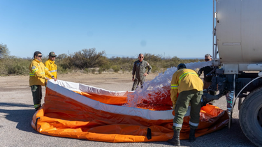 andalgala se capacito en medios aereos y director de tiro para  combatir incendios forestales