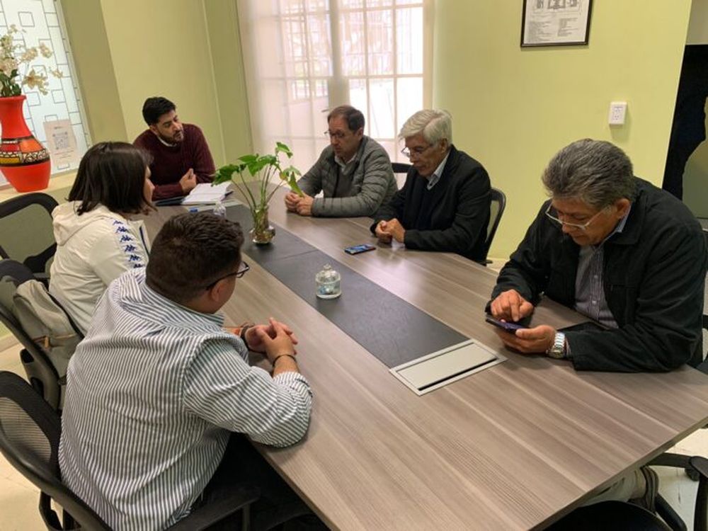Reunión. Contó con la presencia del rector de la UNCA, Arellano.